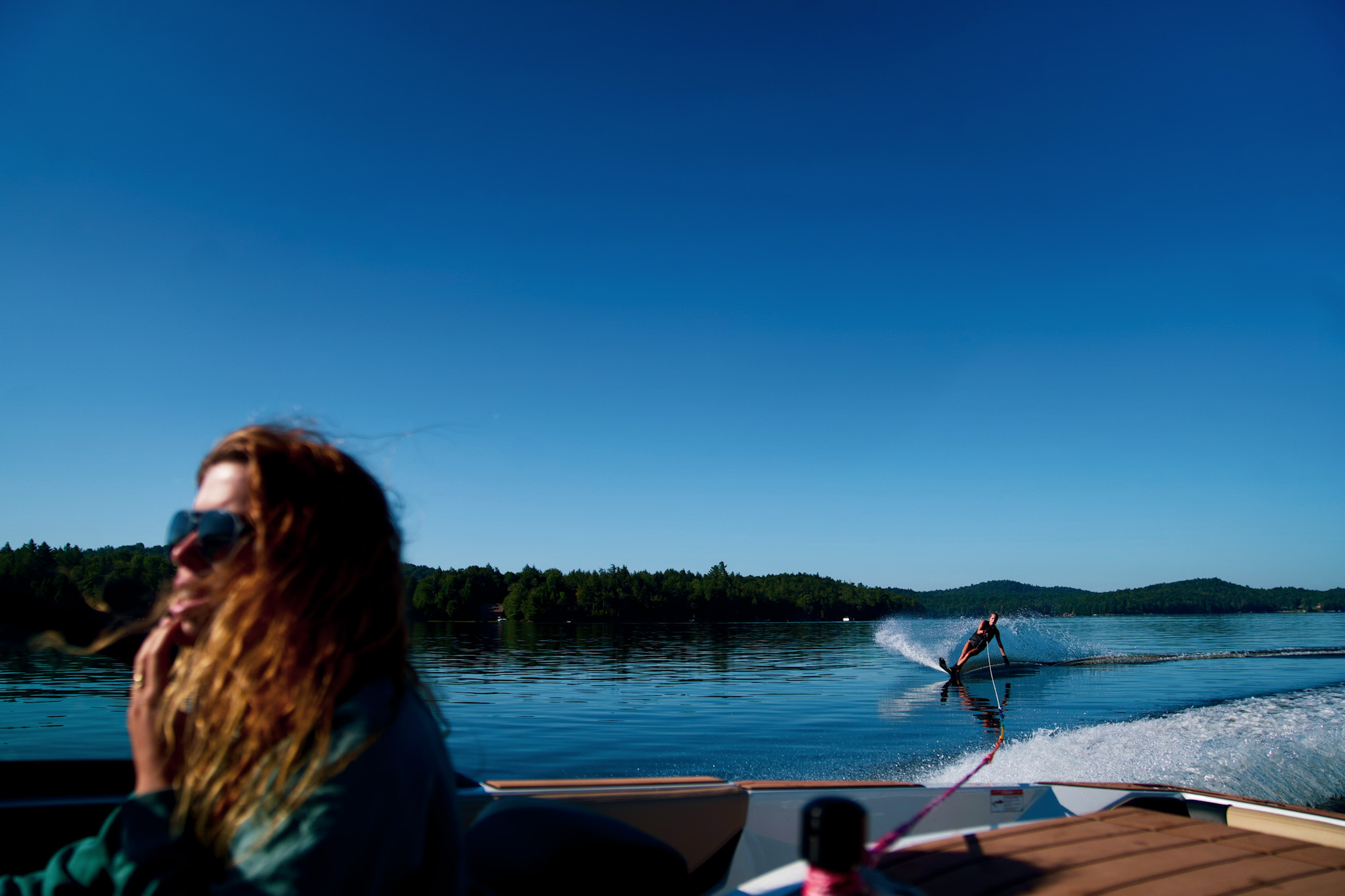 Water skiing on a bright blue lake